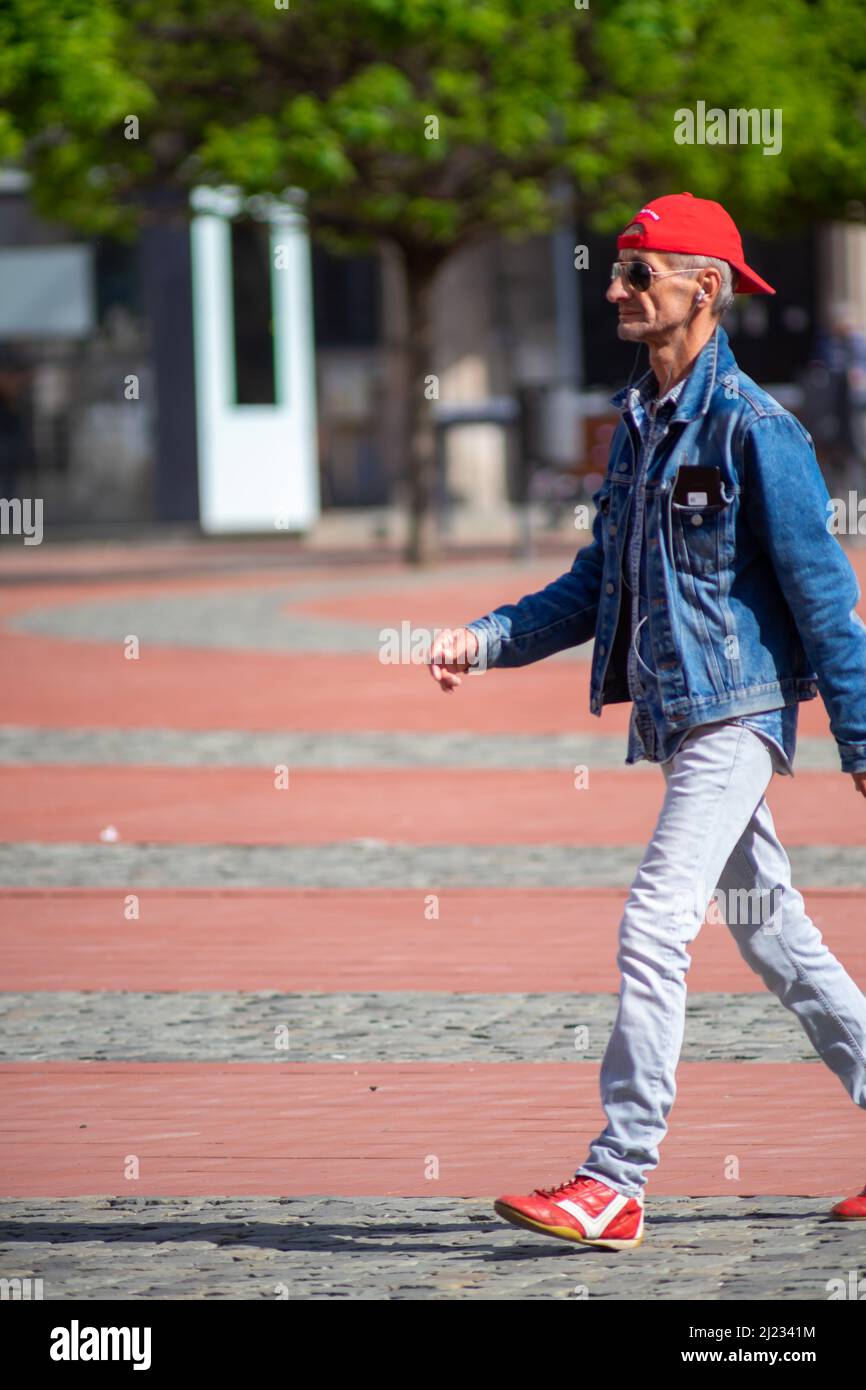 Timisoara, Romania - May 22, 2021: Man walking on the street. Real people  Stock Photo - Alamy
