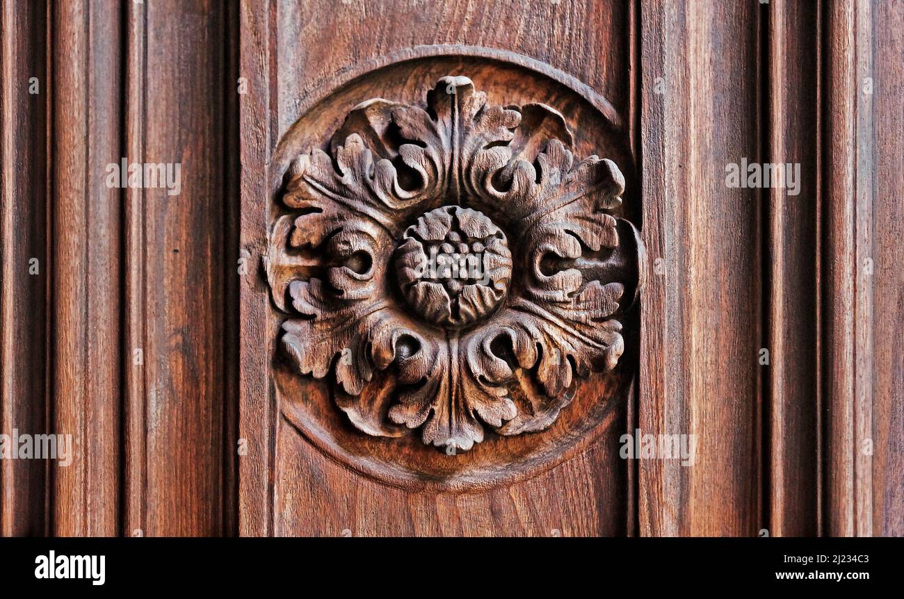 Carved wood, church door detail Stock Photo