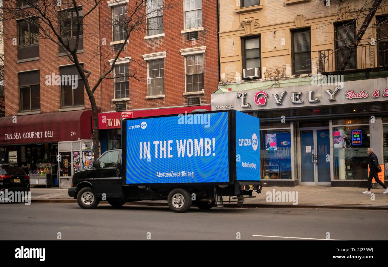 A truck sponsored by the advocacy group CitizenGO promoting anti-abortion and pro-life beliefs in Chelsea in New York on Tuesday, March 22, 2022. CitizenGo, an ultra-conservative advocacy group founded by HazteOir advocates for far-right and Catholic causes via online petitions. CitizenGo started in Madrid, Spain in 2013.  (© Richard B. Levine) Stock Photo