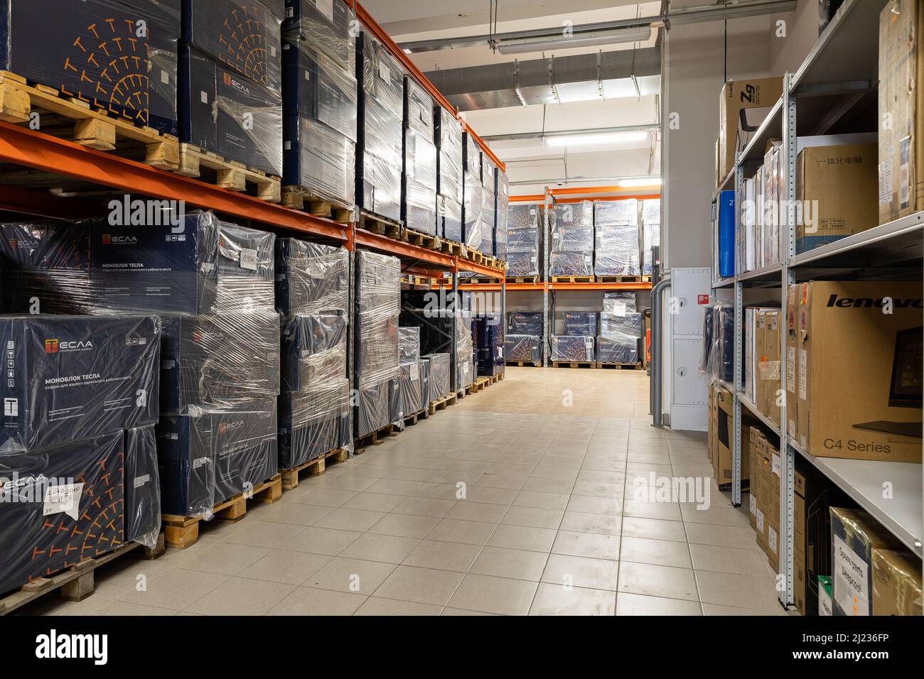 Photo of a warehouse with large boxes on the shelves. Utility room of a