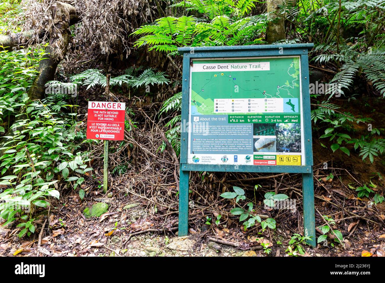 Mahe, Seychelles, 3.05.2021. Casse Dent Nature Trail tourist information board with closed trail information sign in Morne Seychelles National Park. Stock Photo