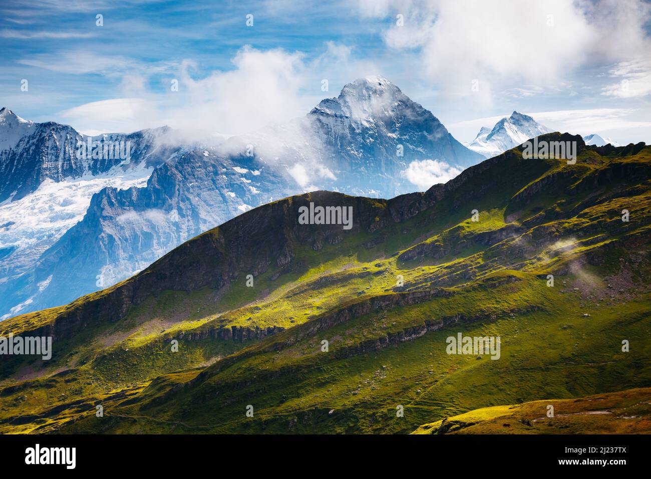 Great view of alpine hill. Picturesque and gorgeous scene. Popular tourist attraction. Location place Swiss alps, Grindelwald valley in the Bernese Ob Stock Photo