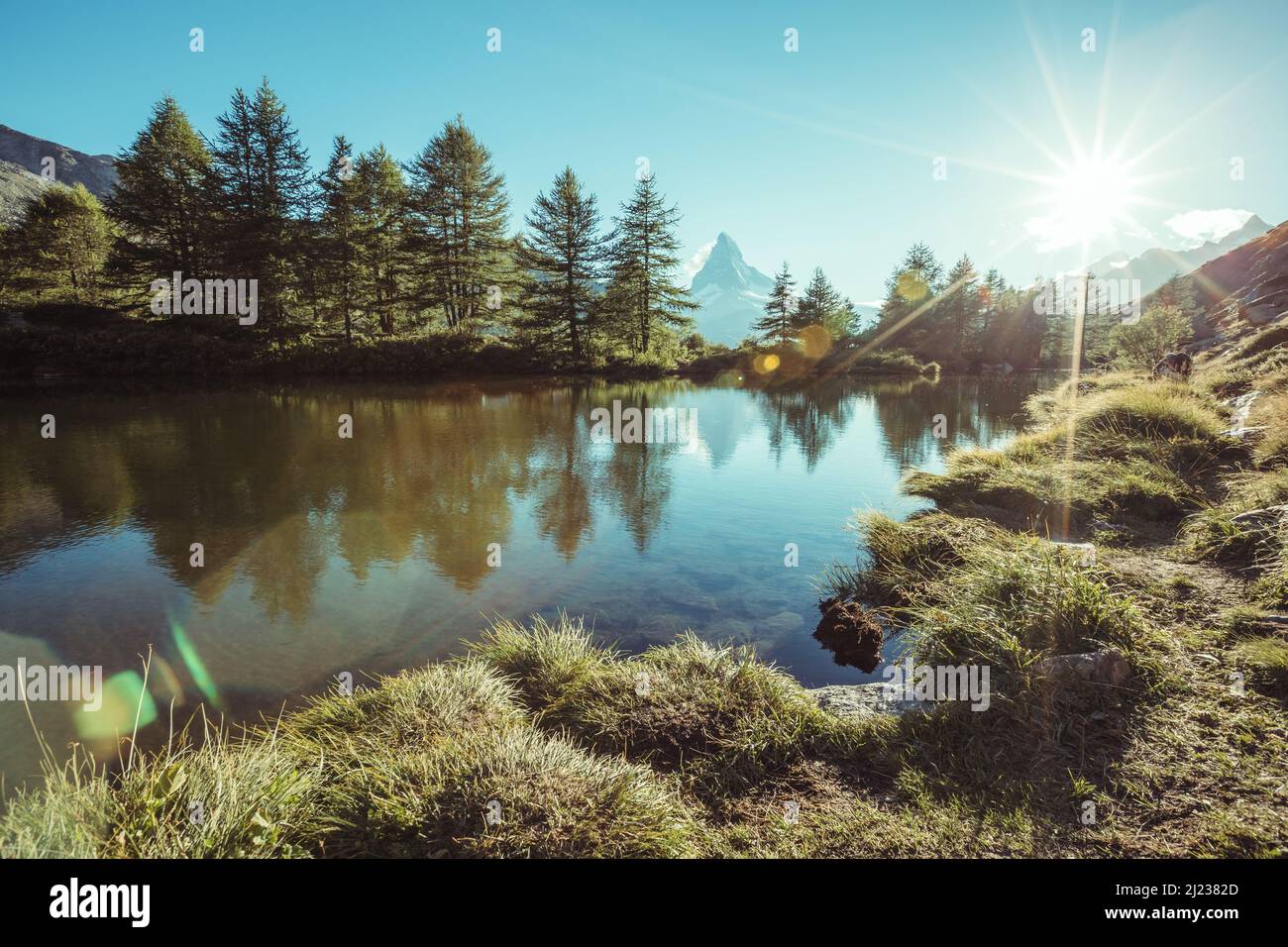 Scenic surroundings with peak Matterhorn in alpine valley. Location