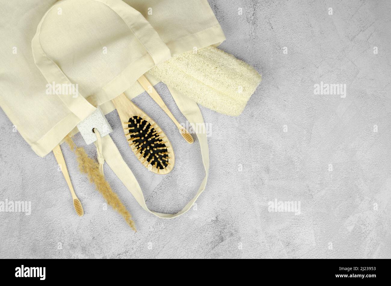 Wooden accessories for personal hygiene and daily life on a concrete