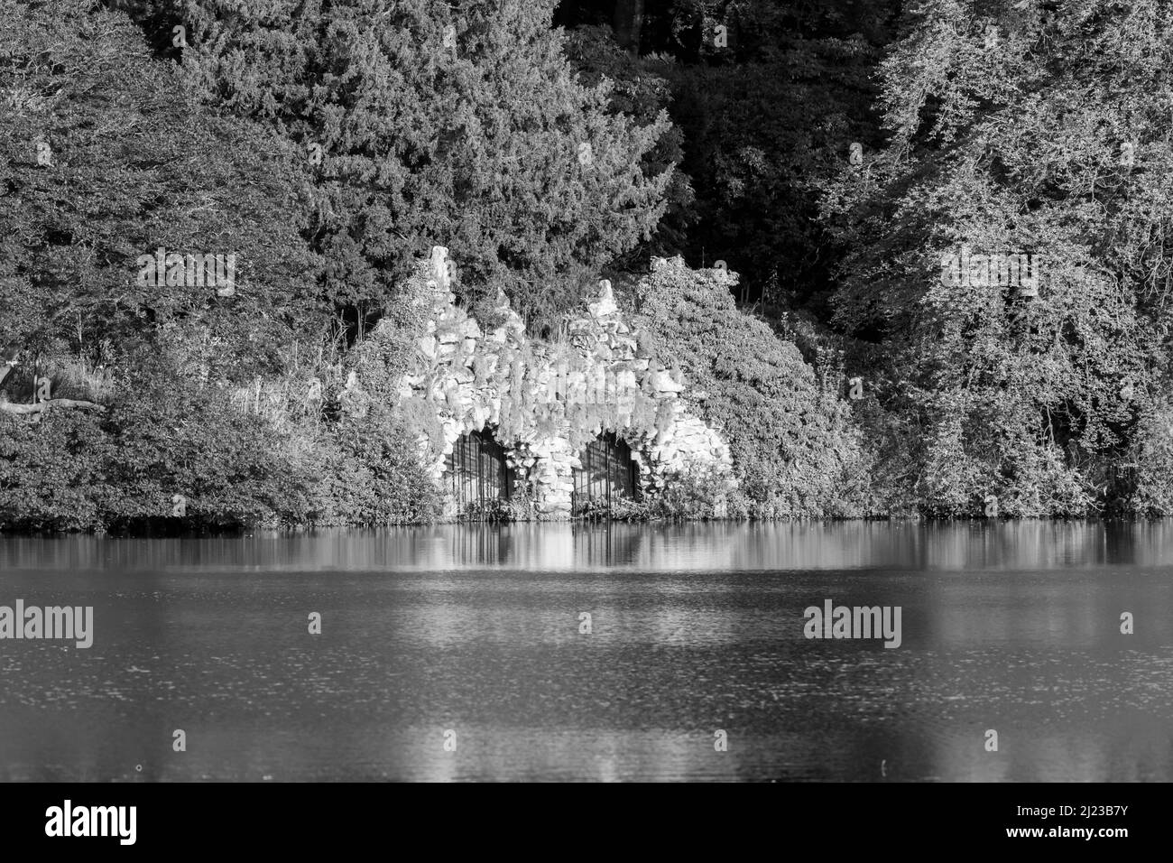 Black and white photo of the boathouse at Stourhead house and gardens in Wiltshire Stock Photo