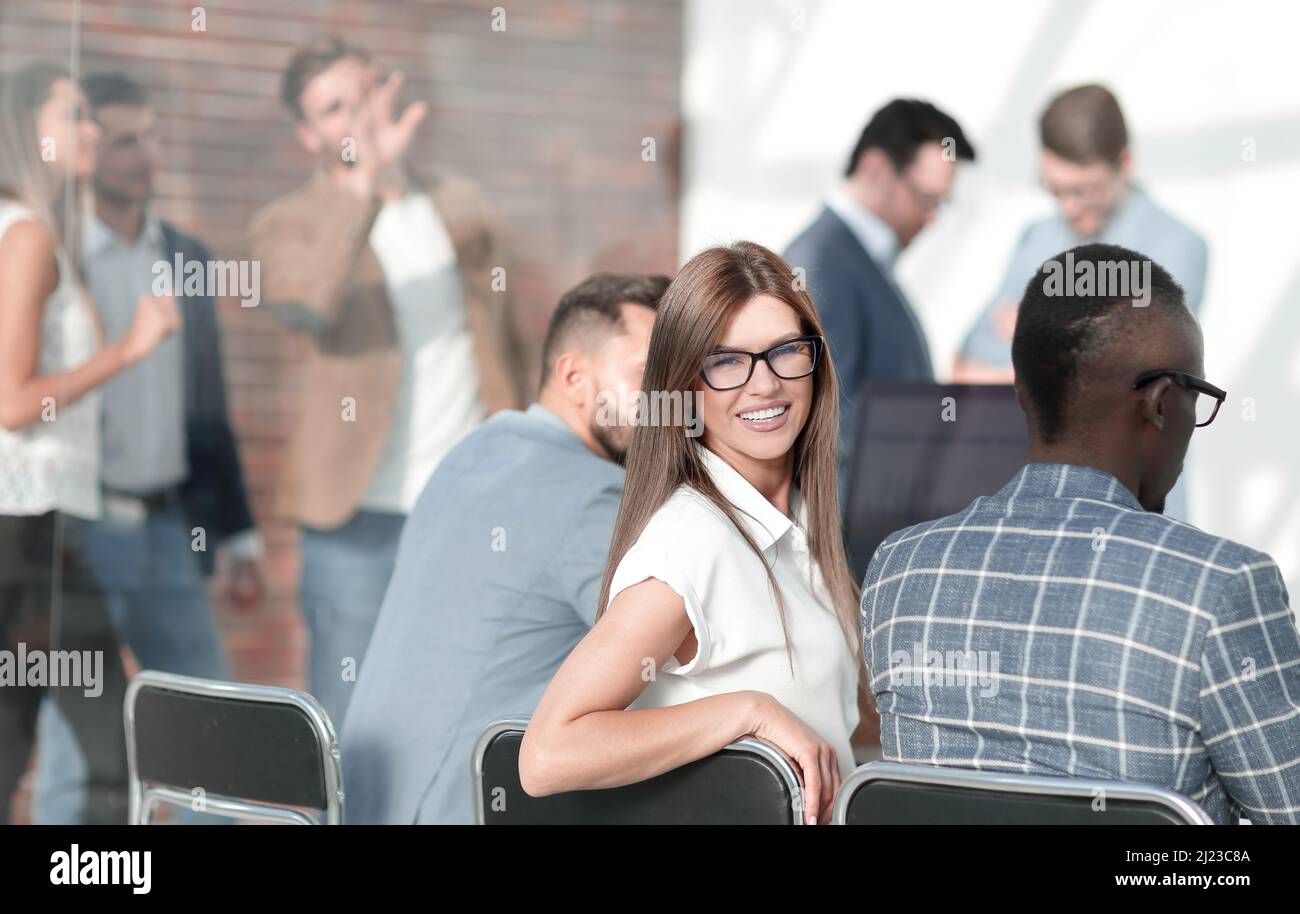 young business woman sitting at office Desk Stock Photo - Alamy