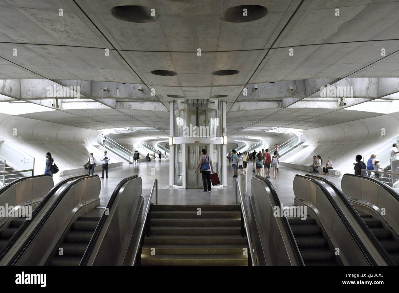 Gare do Oriente train station concourse with escalators connecting metro and train platforms, located in Parque das Nacoes district of Lisbon Portugal Stock Photo