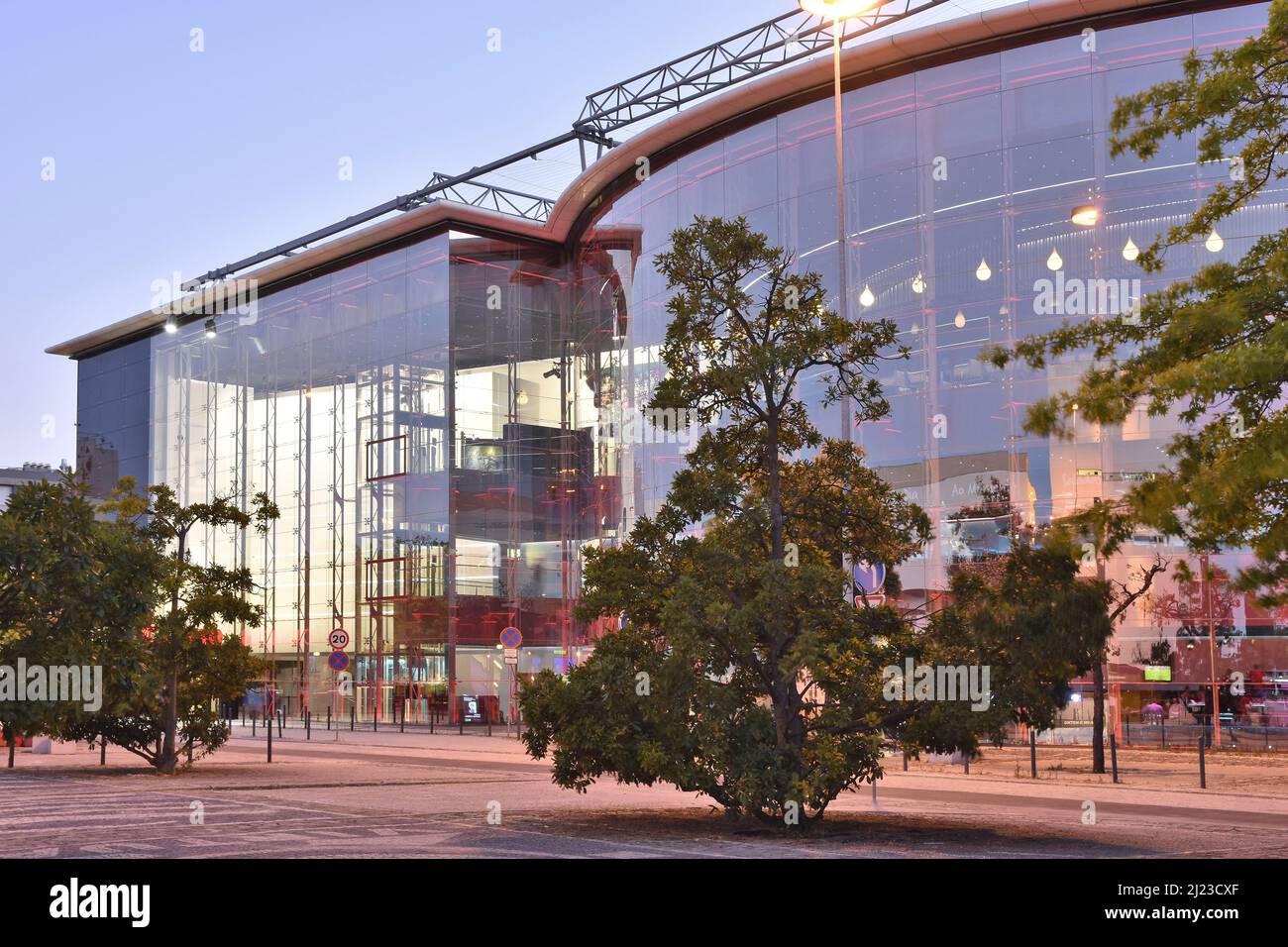 Casino de Lisboa, modern glass building at dusk, located in Parque das Nacoes district of Lisbon Portugal. Stock Photo