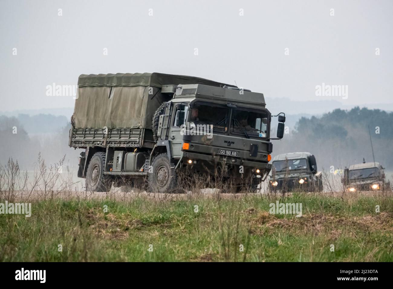 Land Rover Convoy a small convoy British Army Land Rover Defender Wolf medium utility ...