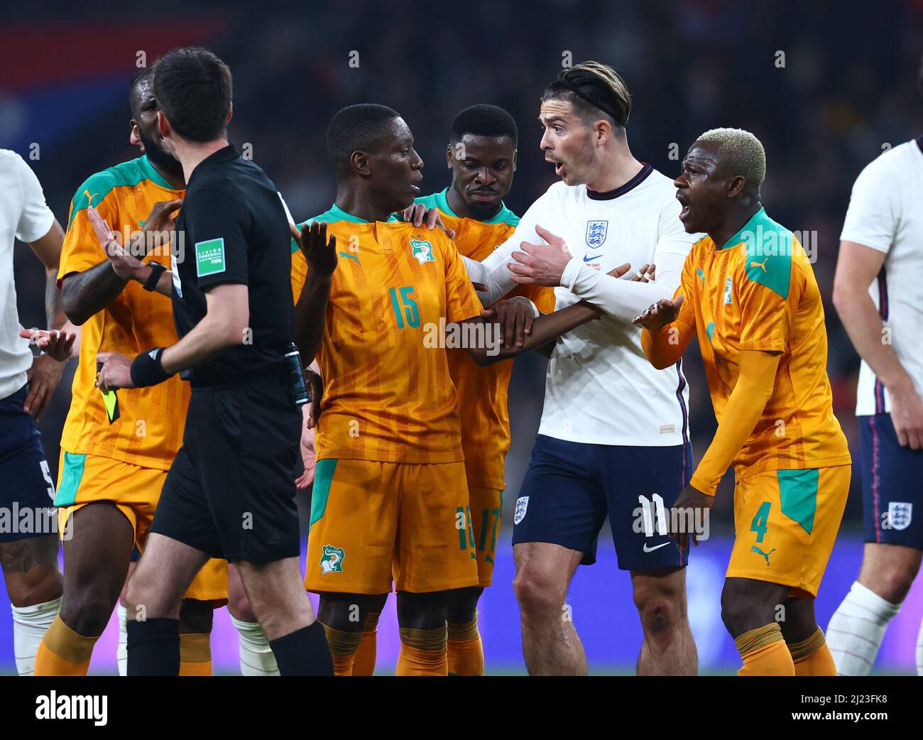 London, England, 29th March 2022.   Max Alain Gradel of Ivory Coast protests the sending off with Jack Grealish of England during the International Friendly match at Wembley Stadium, London. Picture credit should read: David Klein / Sportimage Credit: Sportimage/Alamy Live News Stock Photo
