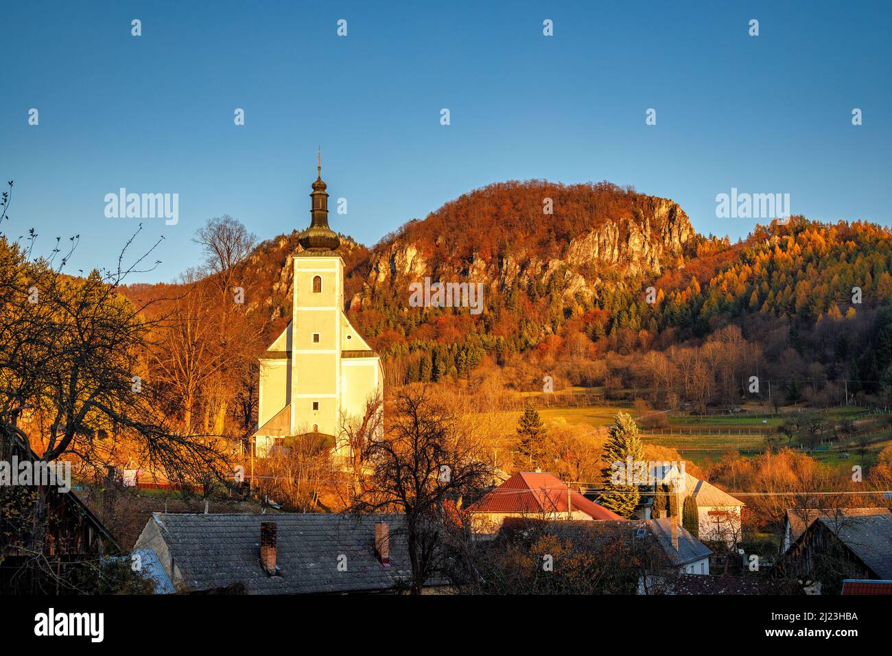 Church in Podskalie village under the Podskalsky Rohac hill in Strazov Mountains Protected Landscape Area, Slovakia, Europe. Stock Photo