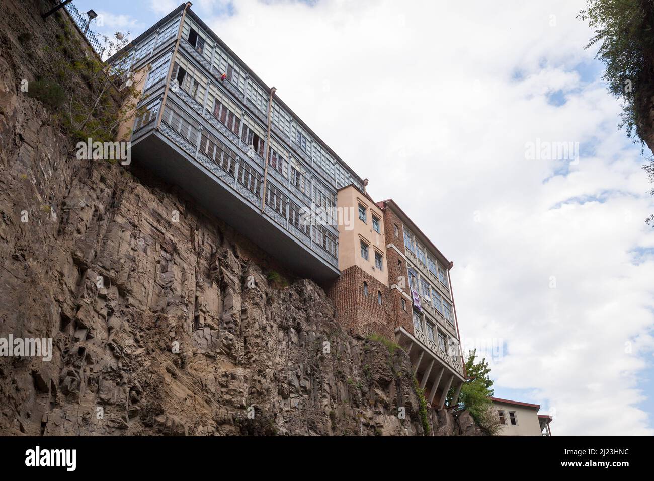 Old Tbilisi town, the Leghvtakhevi Canyon view with old wooden houses on rocks. Georgia Stock Photo