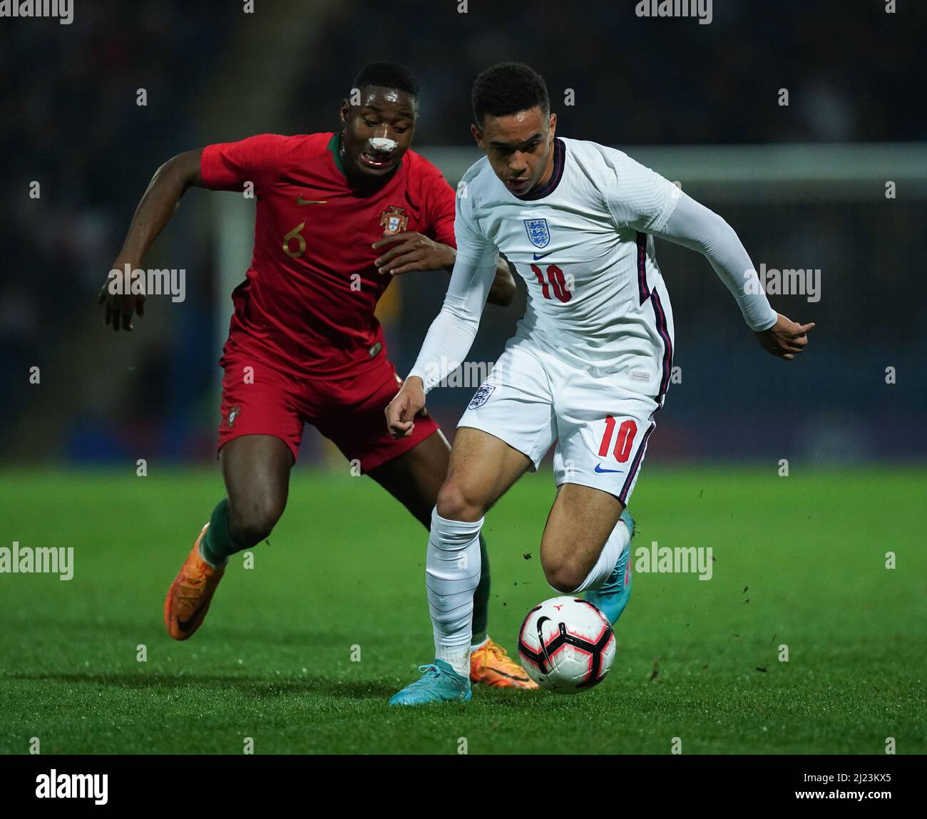 England U19's Aaron Ramsey and Portugal U19's Dario Essugo during the