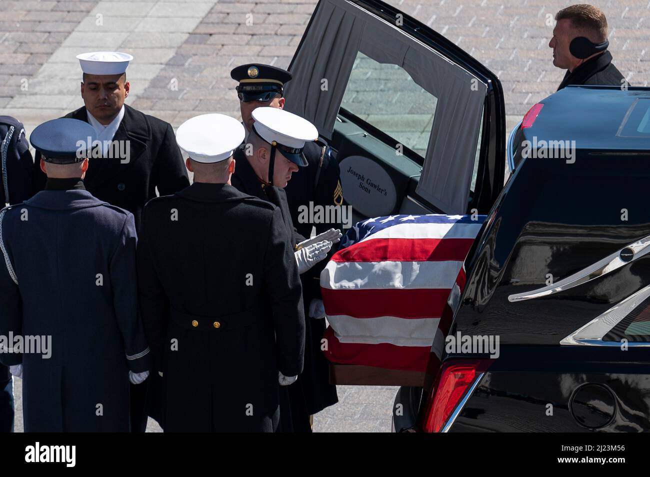 an-honor-guard-arrives-to-receive-the-casket-during-the-congressional