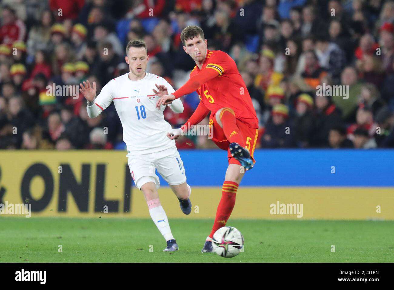 Cardiff, Wales, UK. 29th Mar, 2022. Jan Sykora of Czech Republic and Chris Mepham of Wales during the friendly international between Wales and Czech Republic in aid of the Ukraine humanitarian appeal at the Cardiff City Stadium. Credit: Mark Hawkins/Alamy Live News Stock Photo