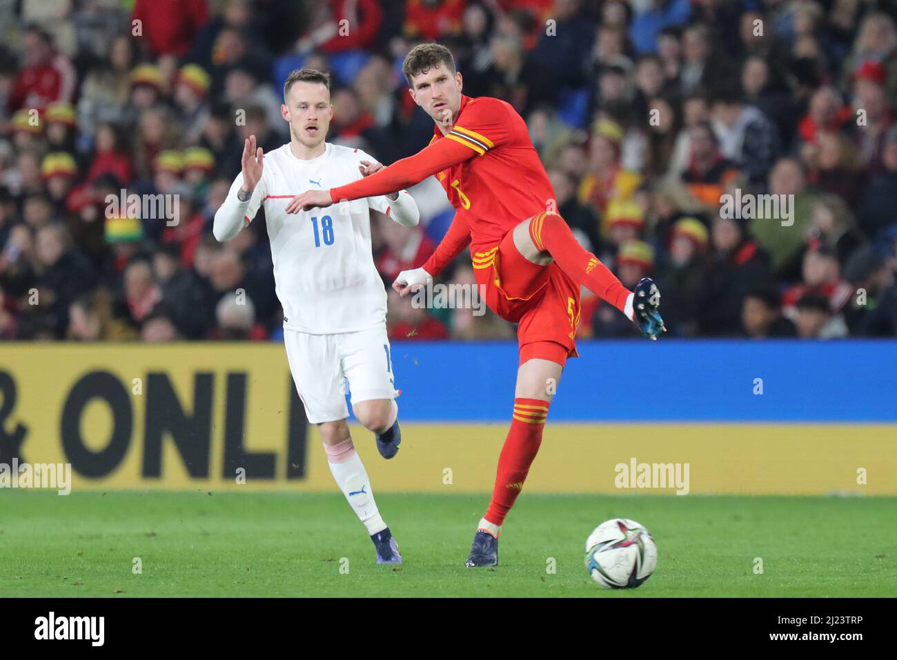 Cardiff, Wales, UK. 29th Mar, 2022. Jan Sykora of Czech Republic and Chris Mepham of Wales during the friendly international between Wales and Czech Republic in aid of the Ukraine humanitarian appeal at the Cardiff City Stadium. Credit: Mark Hawkins/Alamy Live News Stock Photo