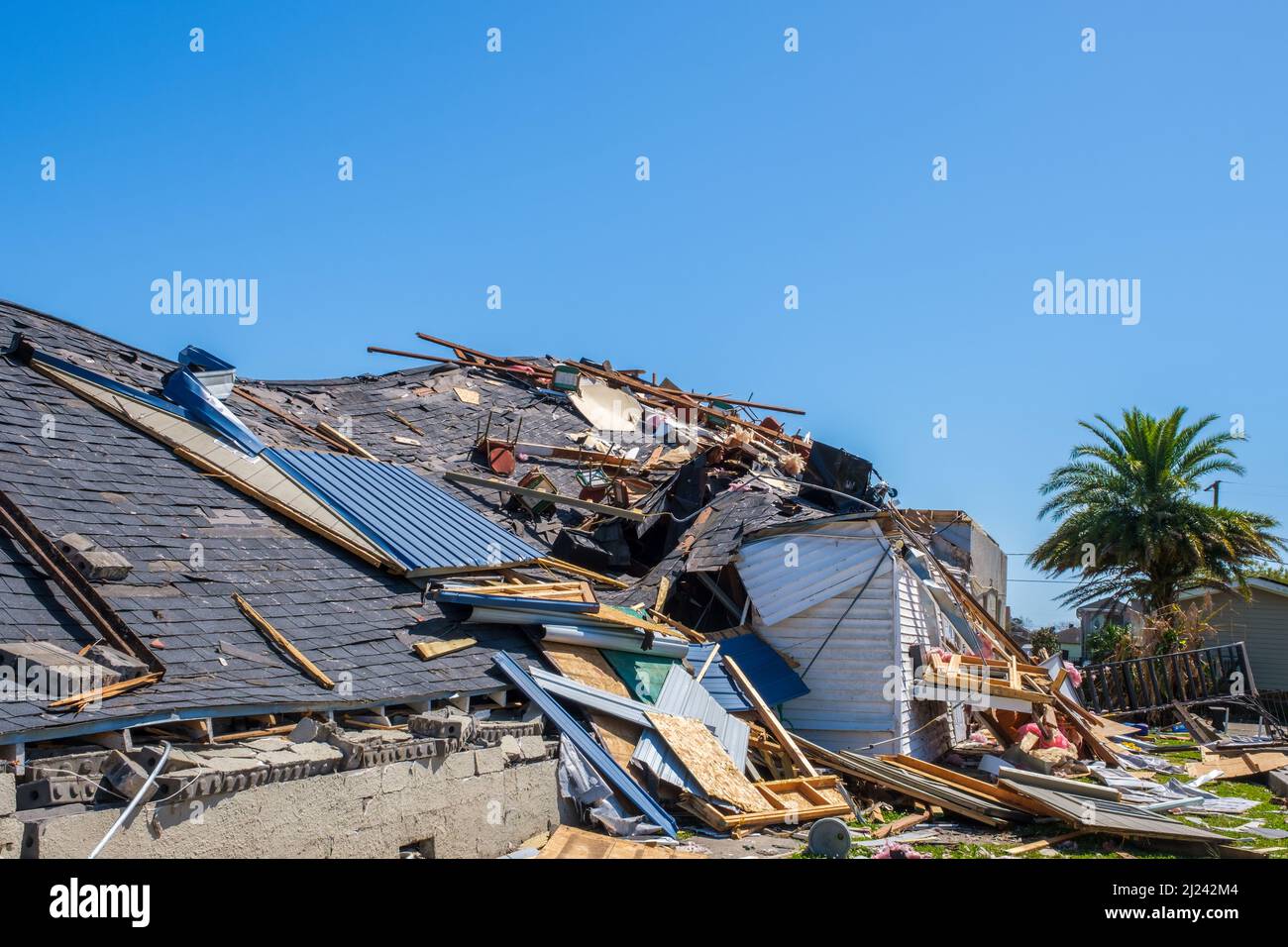 ARABI, LA, USA MARCH 26, 2022 Closeup of flattened roof of Faith