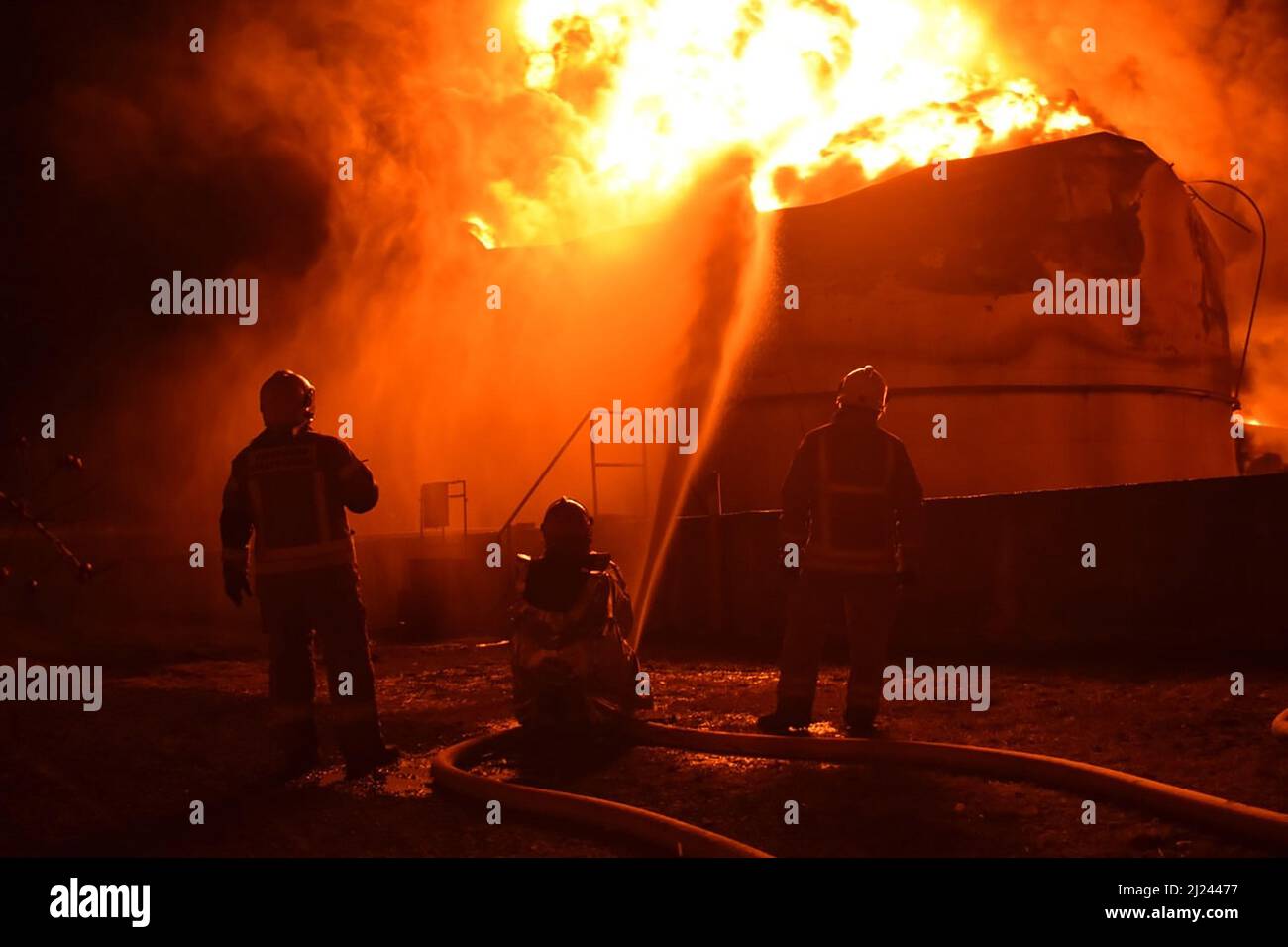 Rivne, Ukraine. 29th Mar, 2022. Rescuers work at a site of fuel storage facilities hit by cruise missiles, as Russia's attack on Ukraine continues, in Rivne region, Ukraine, on Tuesday on March 29, 2022. Credit: UPI/Alamy Live News Stock Photo