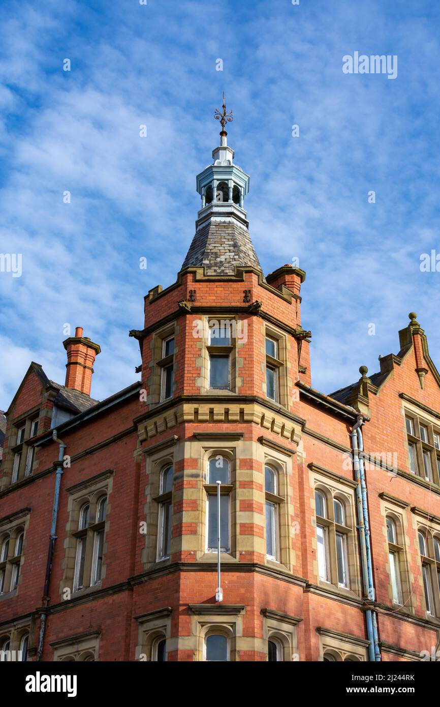 The Old Courts, Wigan town center, with blue sky's behind. Built in the