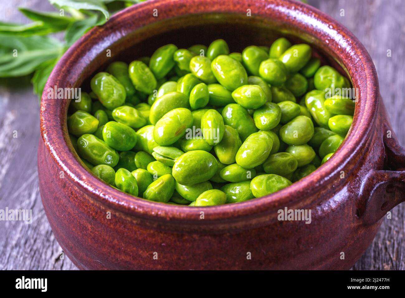 Bowl of Edamame Soybeans on Wooden Background Stock Photo - Alamy