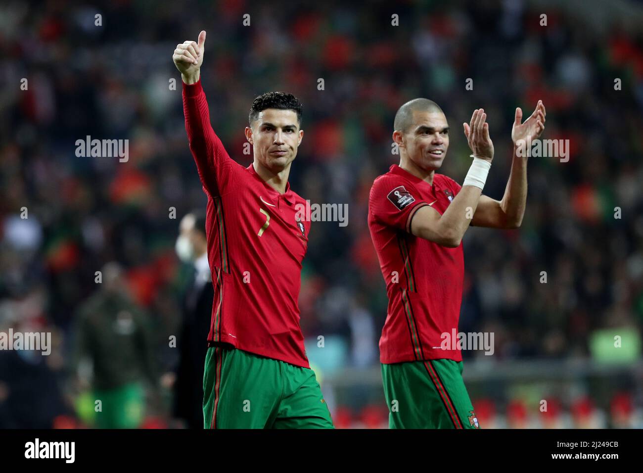 Porto, Portugal. 29th Mar, 2022. Portugal's Cristiano Ronaldo (L) and Pepe celebrate the victory at the end of the 2022 FIFA World Cup Qualifier football match between Portugal and North Macedonia at the Dragao stadium in Porto, Portugal, on March 29, 2022. Credit: Pedro Fiuza/Xinhua/Alamy Live News Stock Photo