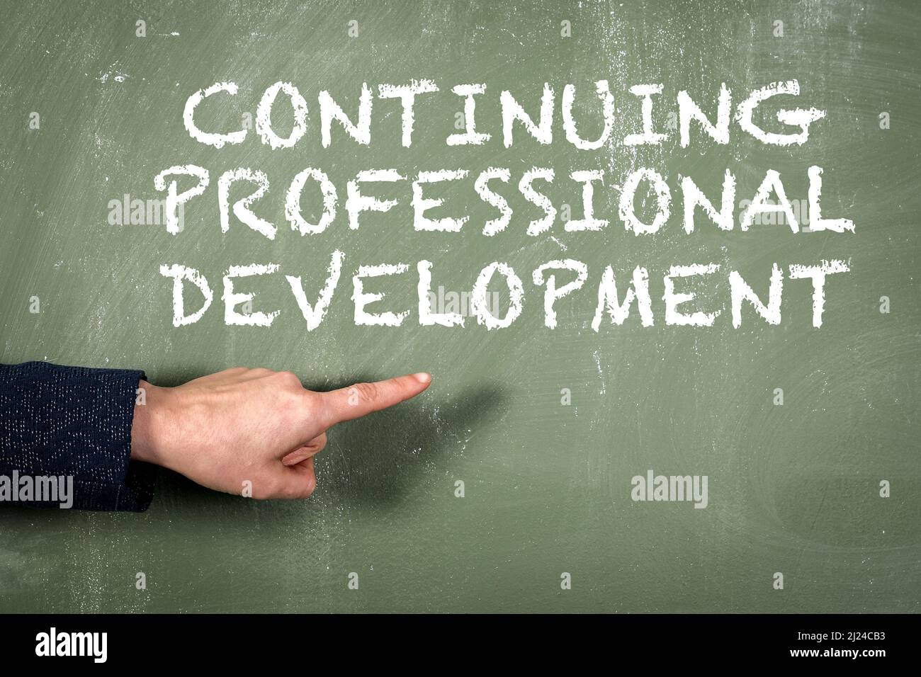 Continuing Professional Development. Text on a green chalkboard ...