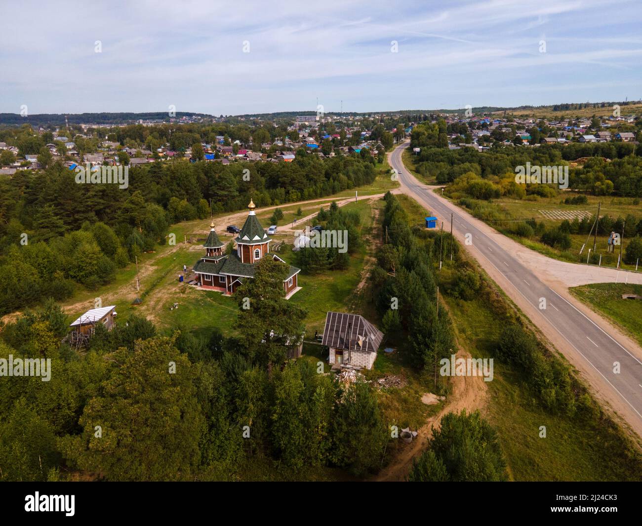 Aerial view of church in forest near road Kirov region Stock Photo