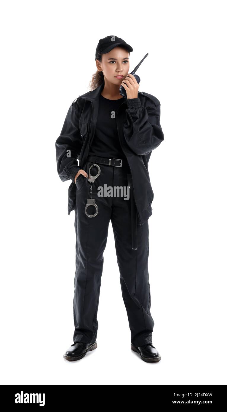 African-American female security guard with radio transmitter on white ...