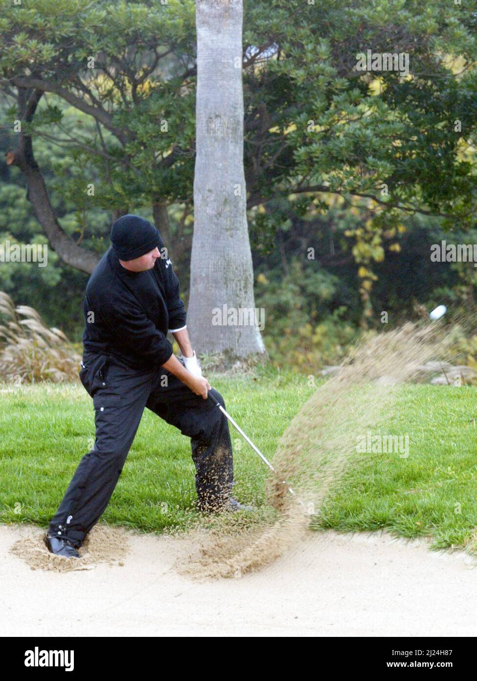 Nov 26, 2004-Seogwipo, South Korea-Harrison Frazar bunker shot play at a PGA TOUR Championship 2 round third bunker in Jeju Island on Nov 26, 2004, South Korea. Stock Photo