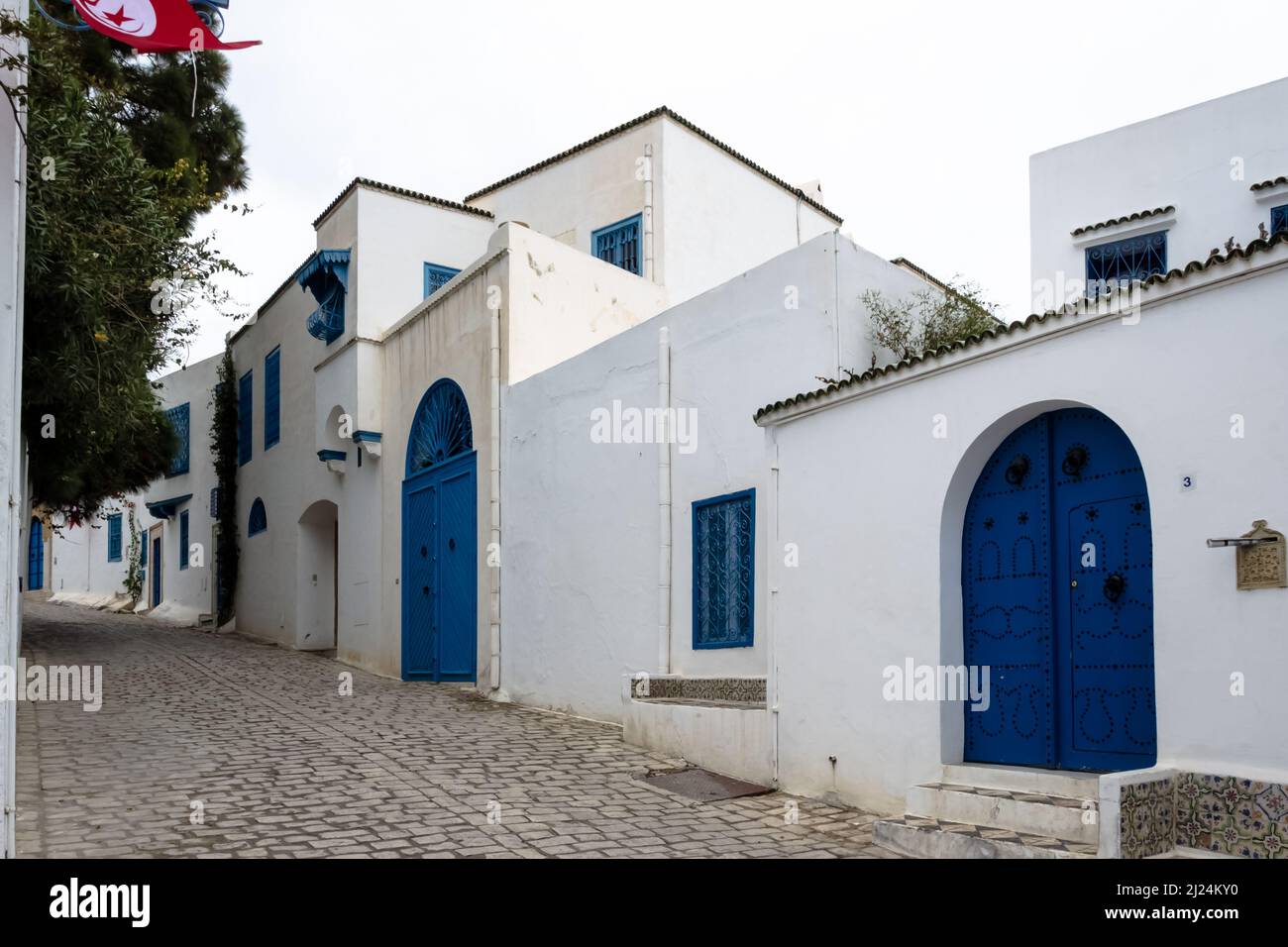 View of the typical houses and streets of the Mediterranean city of Sidi Bou Said, a town in northern Tunisia located about 20 km from Tunis Stock Photo