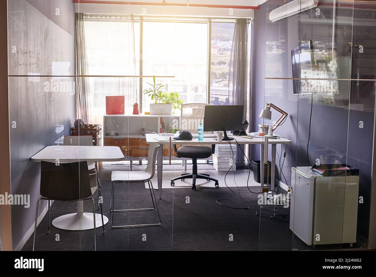Before the office kicks into gear. Shot of an empty office. Stock Photo