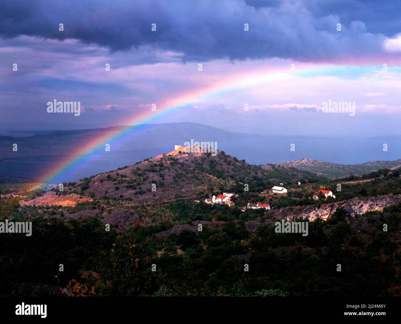 Rainbow over Croatian Coastal Landscape, Croatia Stock Photo
