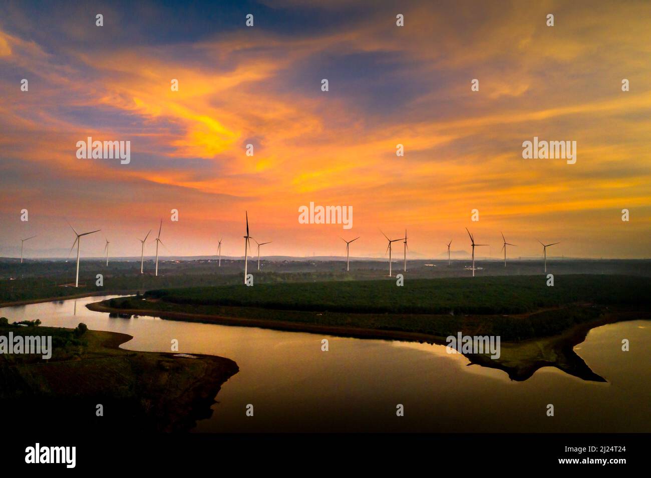 Dawn on the wind power field in Bau Can commune, Chu Prong district, Gia Lai province, Vietnam Stock Photo