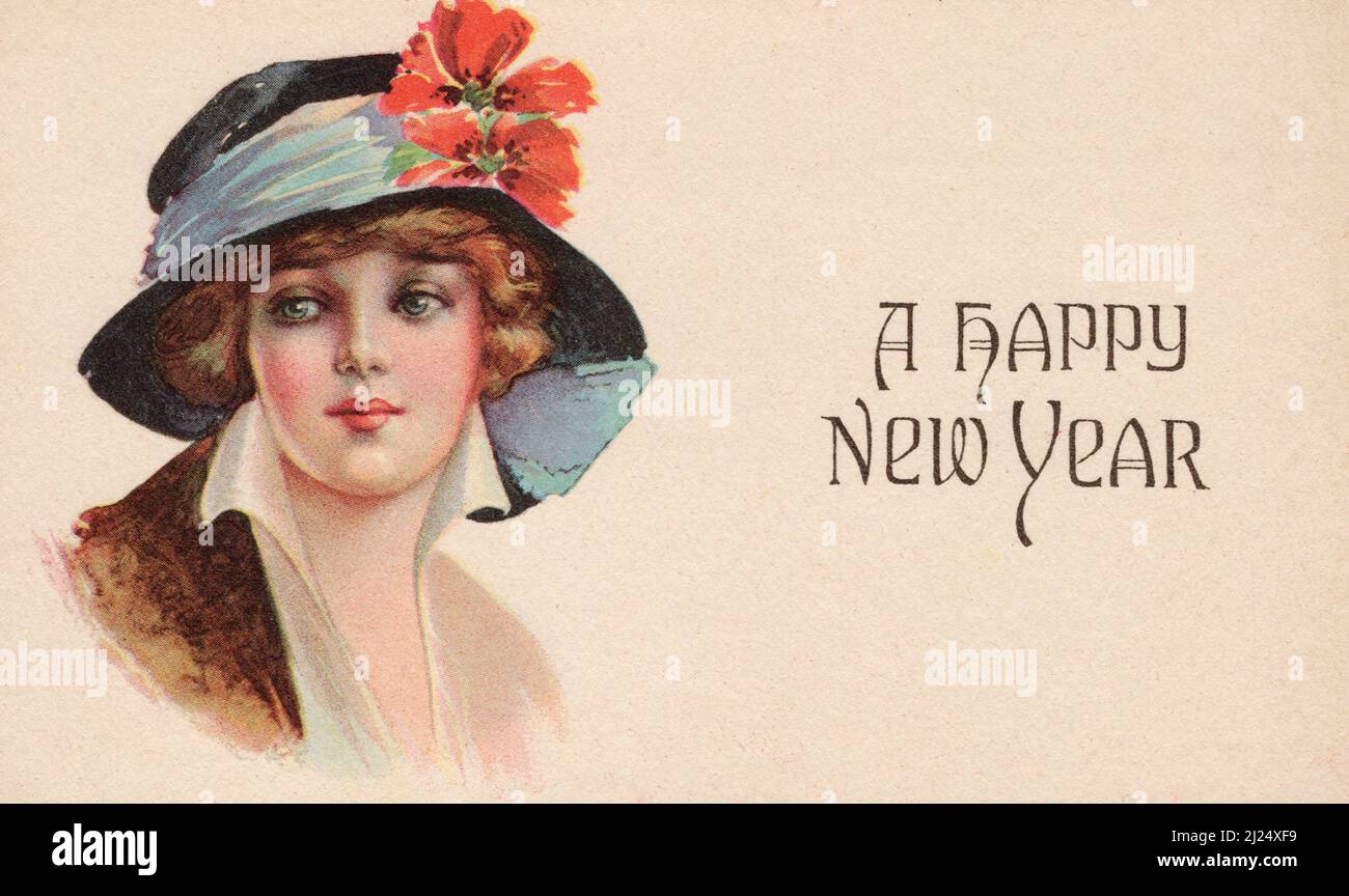 Portrait of young woman with hat and Happy New Year greetings, approx early 1900's postcard. artist unknown Stock Photo