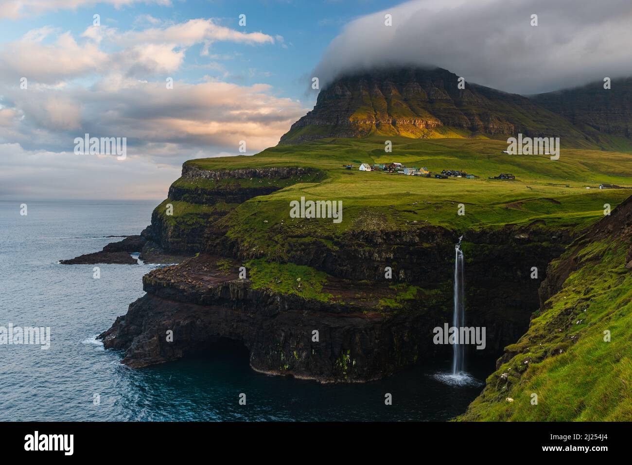 Gásadalur, on the west-side of Vágar in the Faroe Islands, with views ...