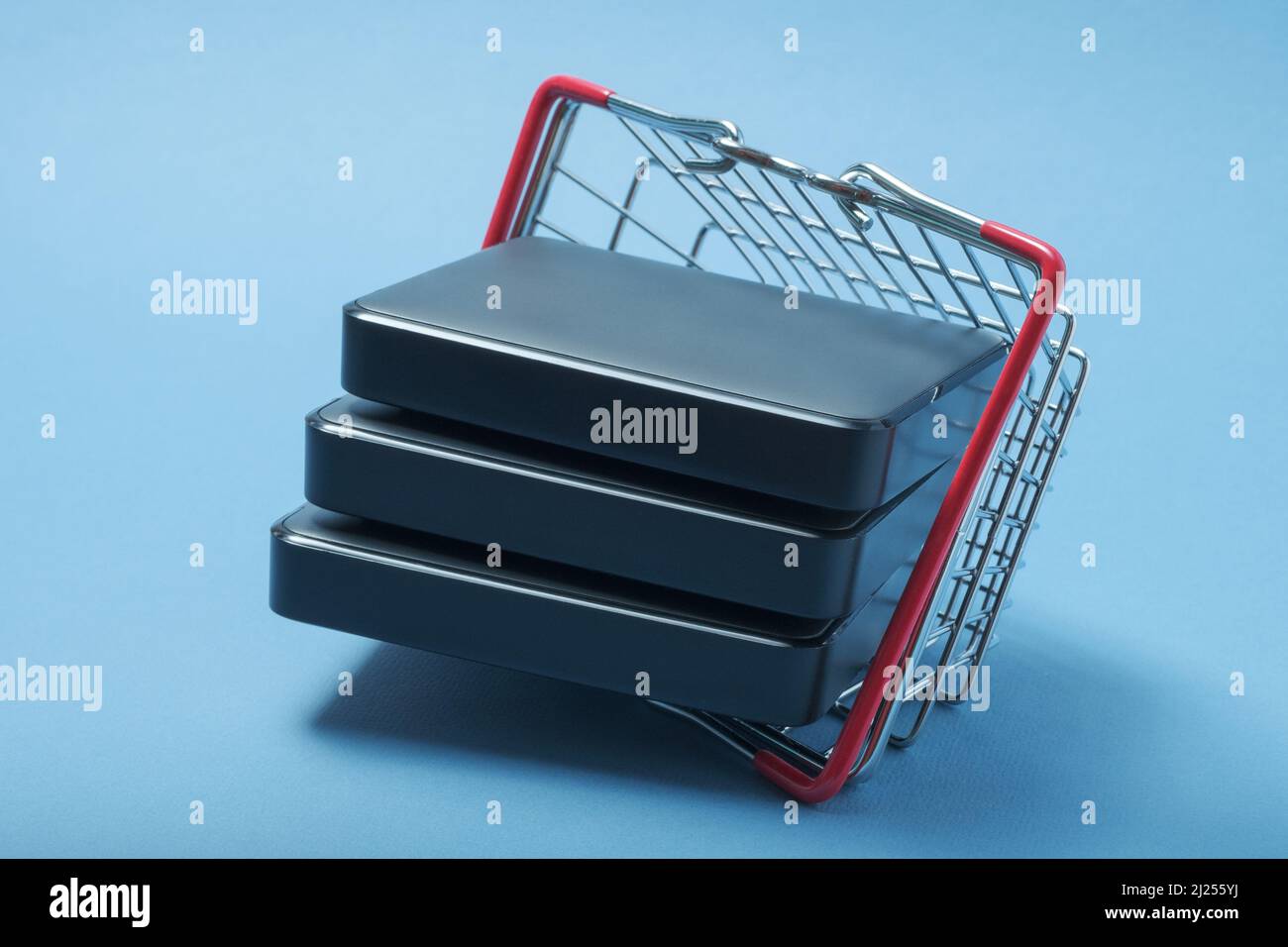 A stack of hard drives in a basket. Stock Photo