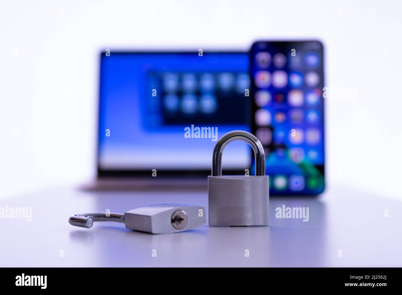Privacy and data protection: Laptop and smartphone with padlocks Stock Photo