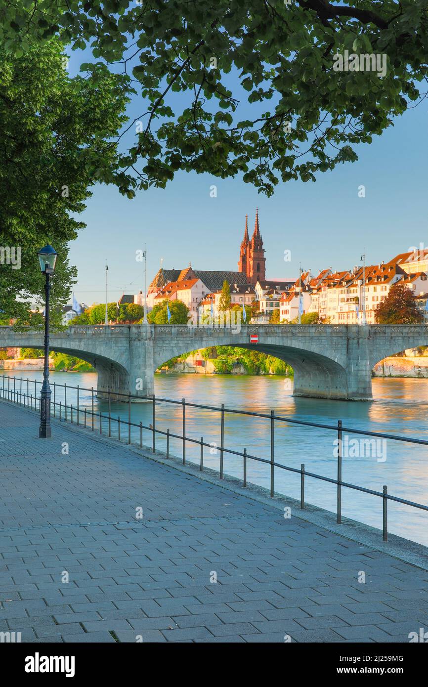 View of the old town of Basel with the Basler Minster, the Martins Church, the bridge Mittlere Bruecke and the river Rhine, Switzerland Stock Photo
