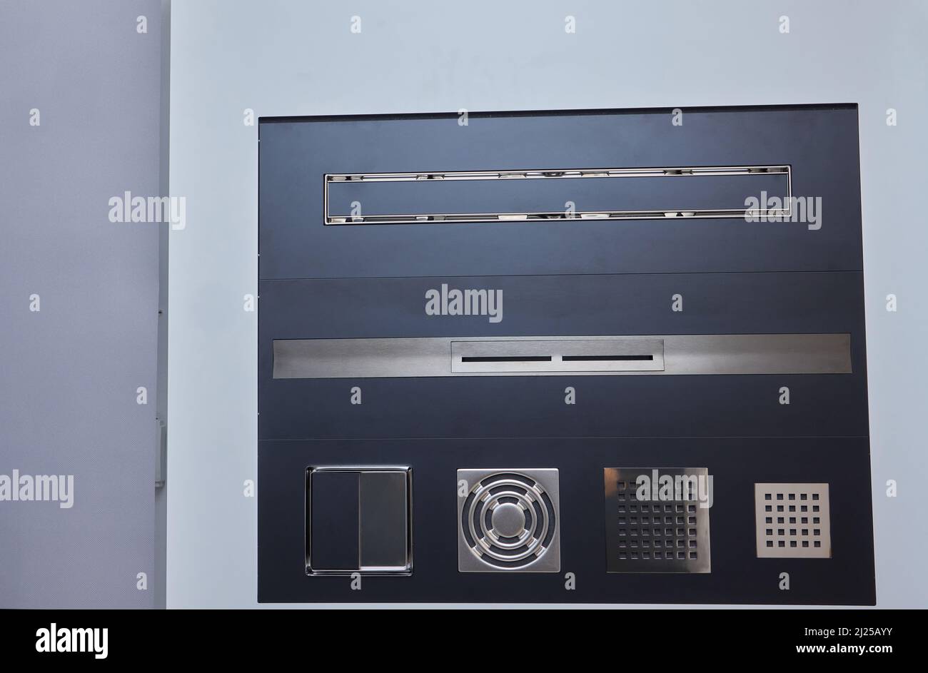 Linear floor level shower. Metal drain on floor shower. Drainage on