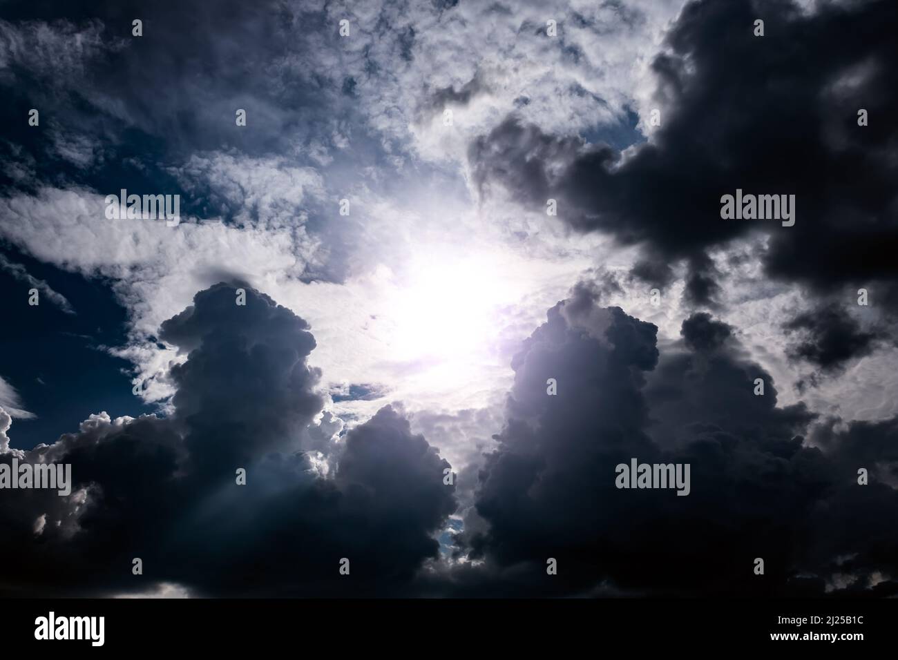 Light in the Dark and Dramatic Storm Clouds Stock Photo - Alamy