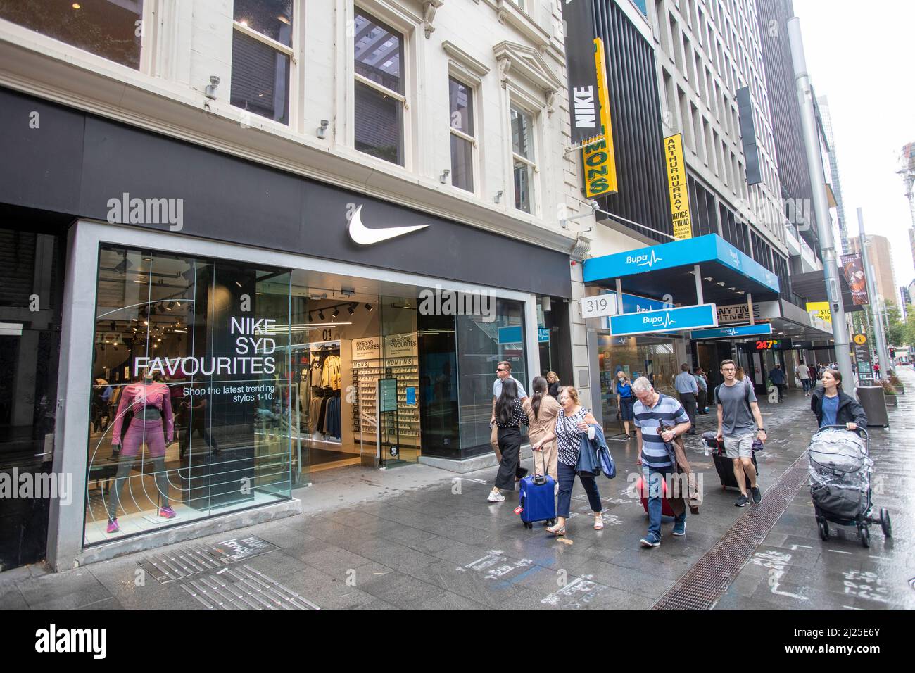 Nike store exterior in George street,Sydney on a wet autumn day,Sydney city centre,Australia Stock Photo