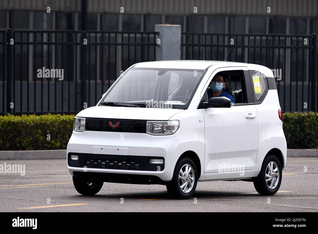 QINGDAO, CHINA - MARCH 30, 2022 - A new energy vehicle is seen at the Qingdao branch of SAIC-GM-Wuling Automobile Co., LTD in Qingdao, East China's Sh Stock Photo