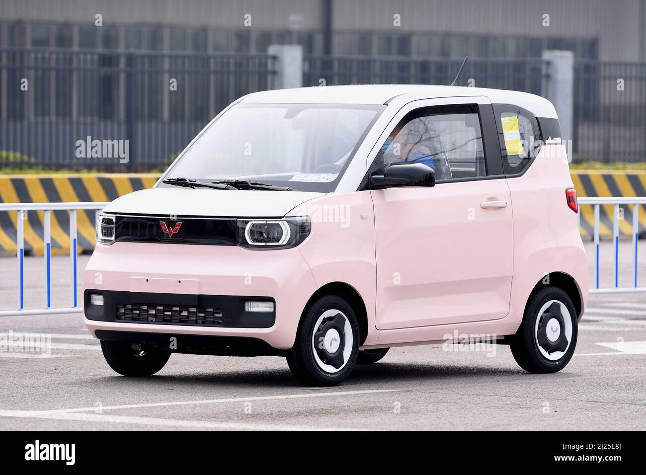 QINGDAO, CHINA - MARCH 30, 2022 - A new energy vehicle is seen at the Qingdao branch of SAIC-GM-Wuling Automobile Co., LTD in Qingdao, East China's Sh Stock Photo