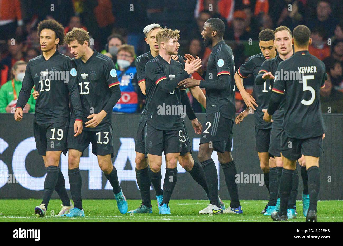 Amsterdam, Netherlands. 29th Mar, 2022. Thomas Müller, DFB 13 celebrates his goal, happy, laugh, celebration, 0-1 with Leroy SANE, DFB 19 Timo Werner, DFB 9 Antonio Rüdiger, Ruediger, DFB 2 Nico Schlotterbeck, DFB 23 Jamal Musiala, DFB 14 David Raum, DFB 3 Thilo Kehrer, DFB 5  in the friendly match NETHERLANDS - GERMANY 1-1 Preparation for World Championships 2022 in Qatar ,Season 2021/2022, on Mar 29, 2022  in Amsterdam, Netherlands.  © Peter Schatz / Alamy Live News Credit: Peter Schatz/Alamy Live News Stock Photo