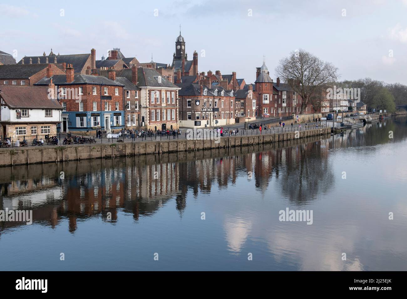 The riverside reflected in the river Ouse in York Stock Photo
