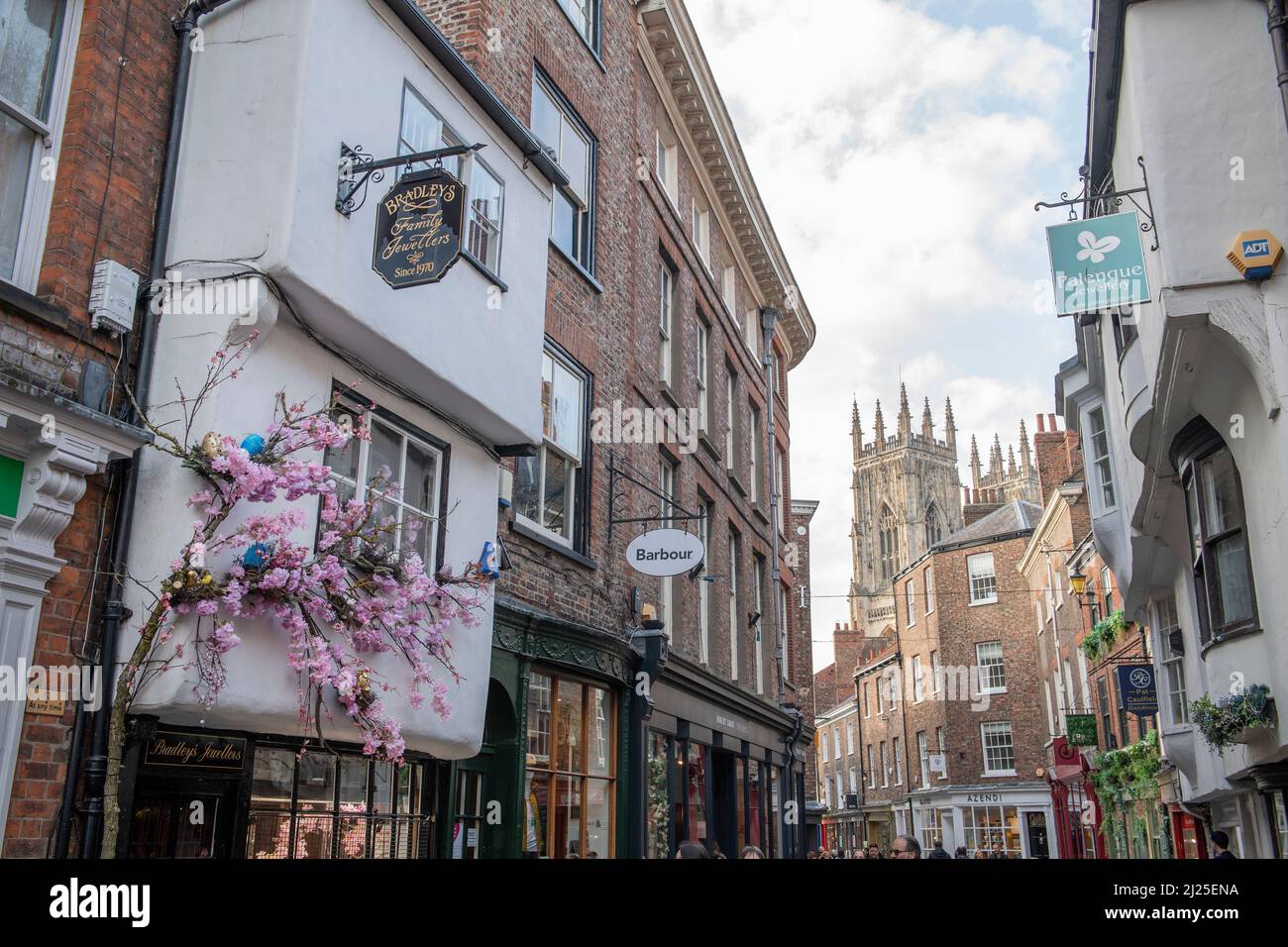 York Minster towers from Low Petergate in York Stock Photo