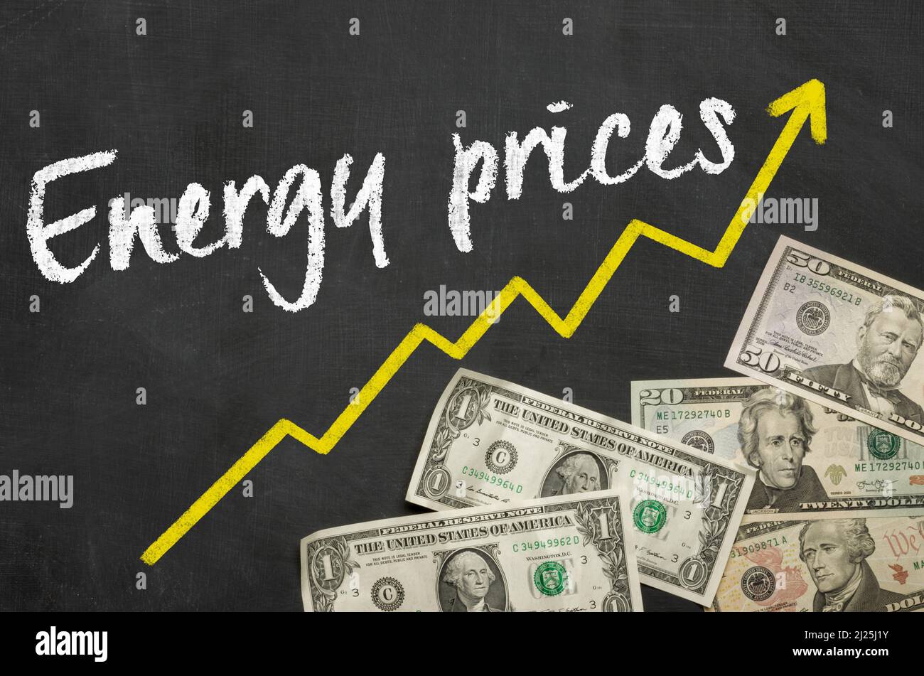 Text on blackboard with Dollars - Energy Prices Stock Photo