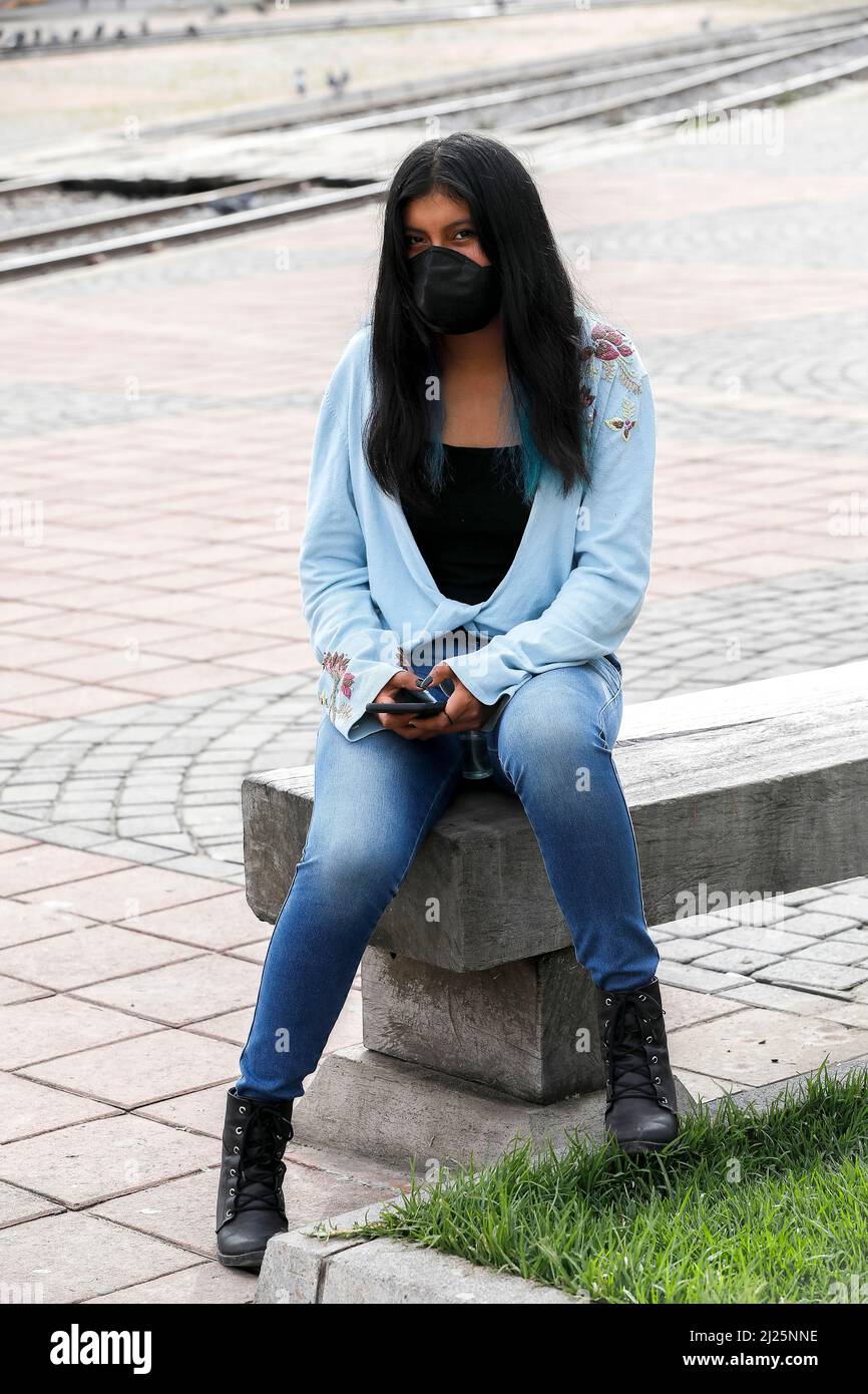 Young woman wearing a face mask in Riobamba, Ecuador Stock Photo
