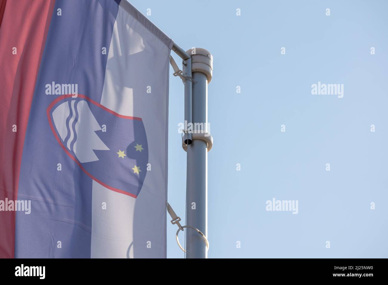 Slovenia national flag waving in the wind. Stock Photo
