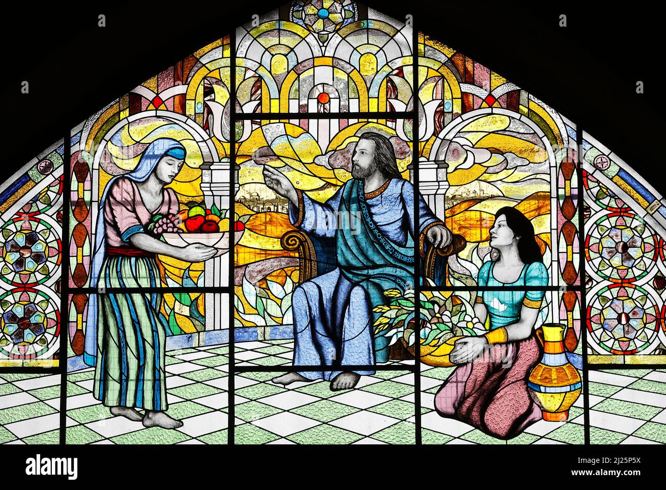 Stained glass window in a catholic church, Cotacachi, Ecuador Stock Photo